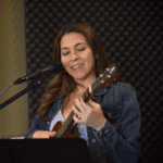 Daniella teaches a ukulele class