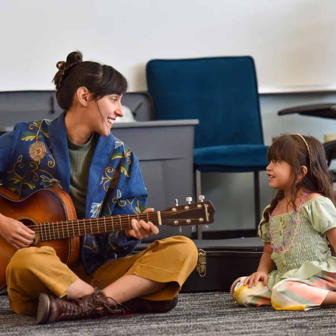 Instructor Adolfo Romero teaches a Little Swallows Early Childhood Education music class at an underresourced Denver metro area school