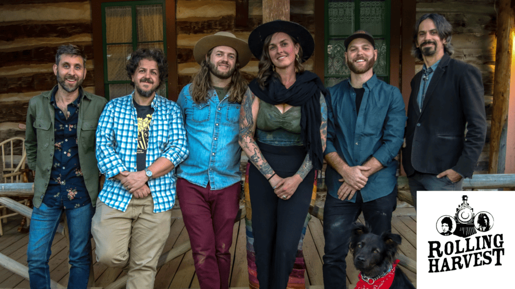 A photo of the 5 members (and their dog) of Rolling Harvest, one of the bands performing at Four Mile Historic Park